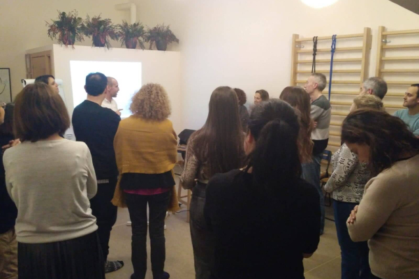 Alumnos en clase de certificación de coaching